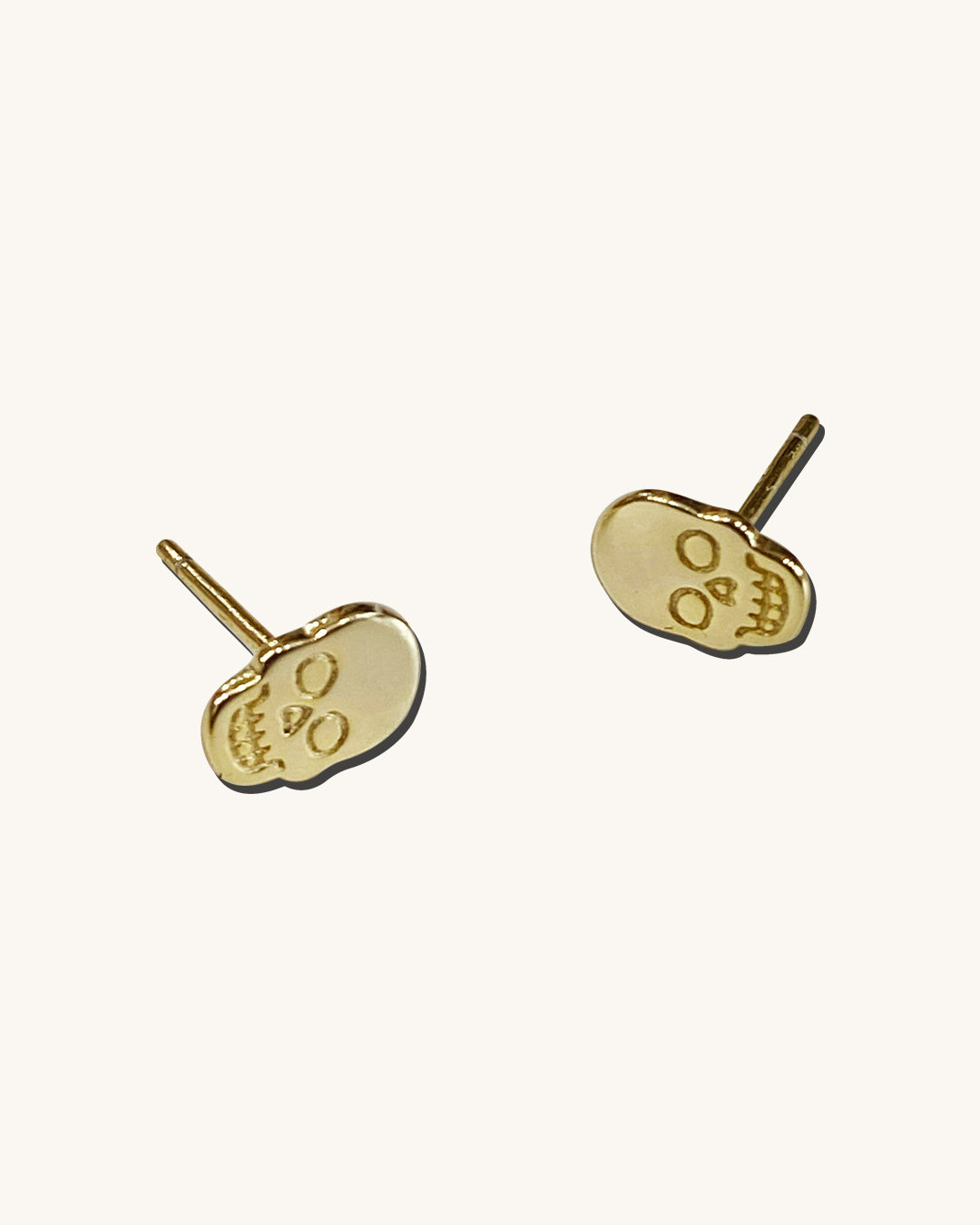 Pressed Gold Skull Stud Earrings